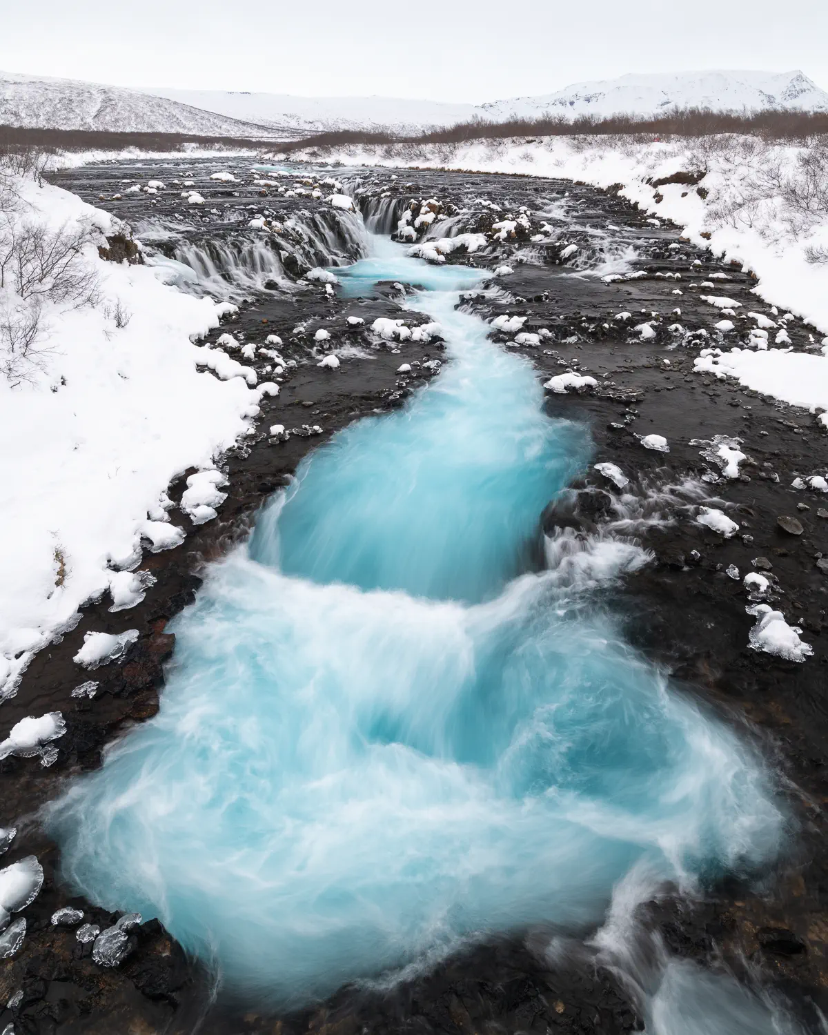 Brúarfoss and its glacier-blue waters